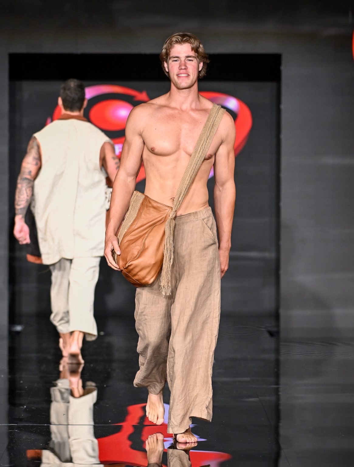 MIAMI BEACH, FLORIDA - MAY 31: A model walks the runway at the Love For Upcycling show during Miami Swim Week Powered By Art Hearts Fashion at Eden Roc Hotel on May 31, 2025 in Miami Beach, Florida. (Photo by Arun Nevader/Getty Images for Art Hearts Fashion)