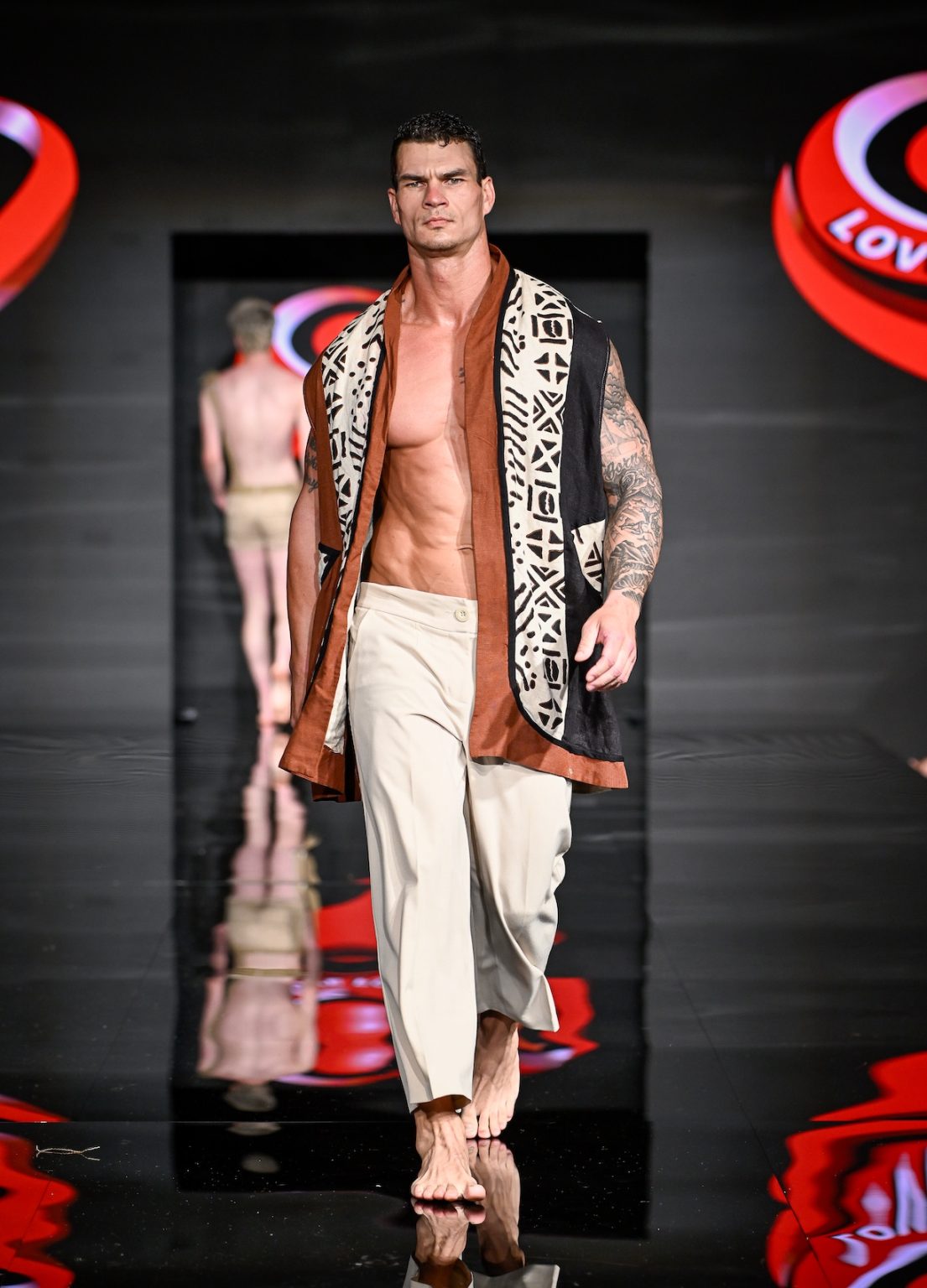 MIAMI BEACH, FLORIDA - MAY 31: A model walks the runway at the Love For Upcycling show during Miami Swim Week Powered By Art Hearts Fashion at Eden Roc Hotel on May 31, 2025 in Miami Beach, Florida. (Photo by Arun Nevader/Getty Images for Art Hearts Fashion)