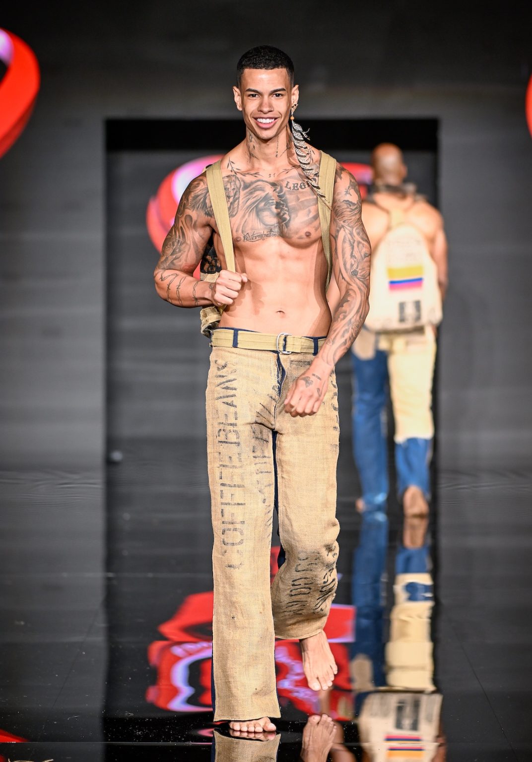 MIAMI BEACH, FLORIDA - MAY 31: A model walks the runway at the Love For Upcycling show during Miami Swim Week Powered By Art Hearts Fashion at Eden Roc Hotel on May 31, 2025 in Miami Beach, Florida. (Photo by Arun Nevader/Getty Images for Art Hearts Fashion)