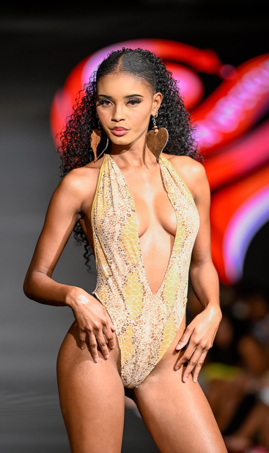 MIAMI BEACH, FLORIDA - MAY 31: A model walks the runway at the Love For Upcycling show during Miami Swim Week Powered By Art Hearts Fashion at Eden Roc Hotel on May 31, 2025 in Miami Beach, Florida. (Photo by Arun Nevader/Getty Images for Art Hearts Fashion)