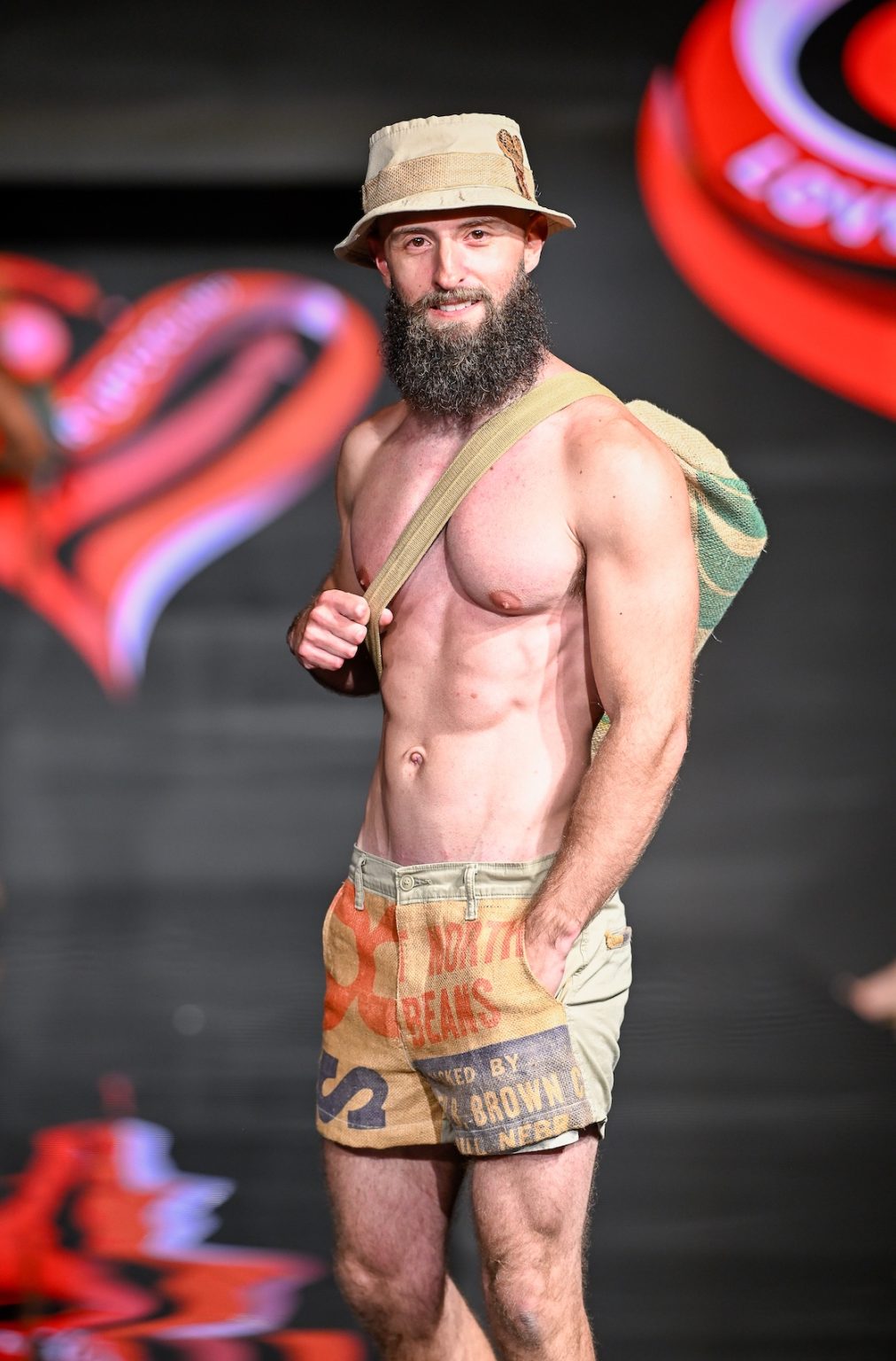 MIAMI BEACH, FLORIDA - MAY 31: A model walks the runway at the Love For Upcycling show during Miami Swim Week Powered By Art Hearts Fashion at Eden Roc Hotel on May 31, 2025 in Miami Beach, Florida. (Photo by Arun Nevader/Getty Images for Art Hearts Fashion)