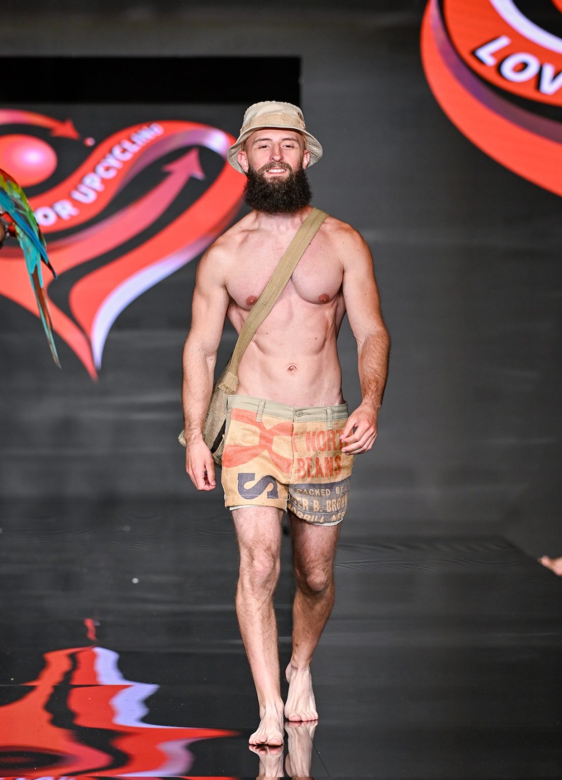 MIAMI BEACH, FLORIDA - MAY 31: A model walks the runway at the Love For Upcycling show during Miami Swim Week Powered By Art Hearts Fashion at Eden Roc Hotel on May 31, 2025 in Miami Beach, Florida. (Photo by Arun Nevader/Getty Images for Art Hearts Fashion)