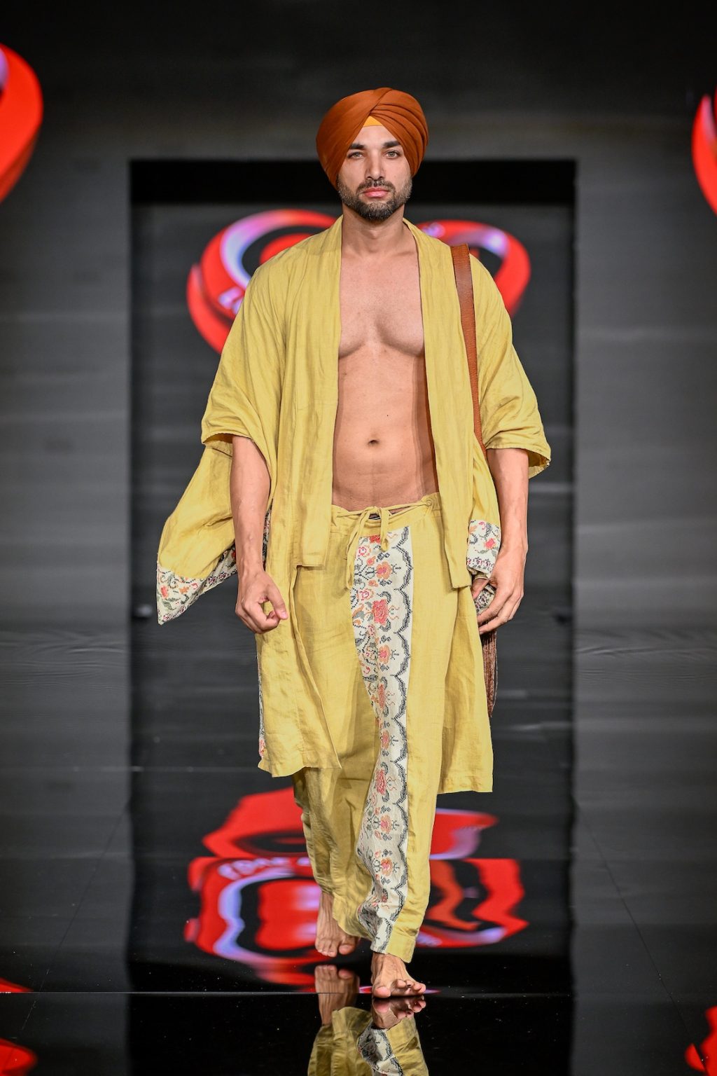 MIAMI BEACH, FLORIDA - MAY 31: Jagjeet Talwar walks the runway at the Love For Upcycling show during Miami Swim Week Powered By Art Hearts Fashion at Eden Roc Hotel on May 31, 2025 in Miami Beach, Florida. (Photo by Arun Nevader/Getty Images for Art Hearts Fashion)