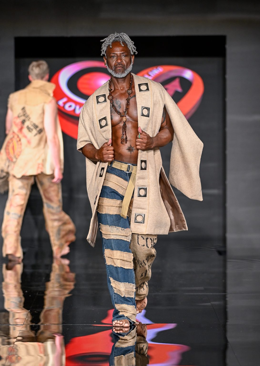 MIAMI BEACH, FLORIDA - MAY 31: A model walks the runway at the Love For Upcycling show during Miami Swim Week Powered By Art Hearts Fashion at Eden Roc Hotel on May 31, 2025 in Miami Beach, Florida. (Photo by Arun Nevader/Getty Images for Art Hearts Fashion)