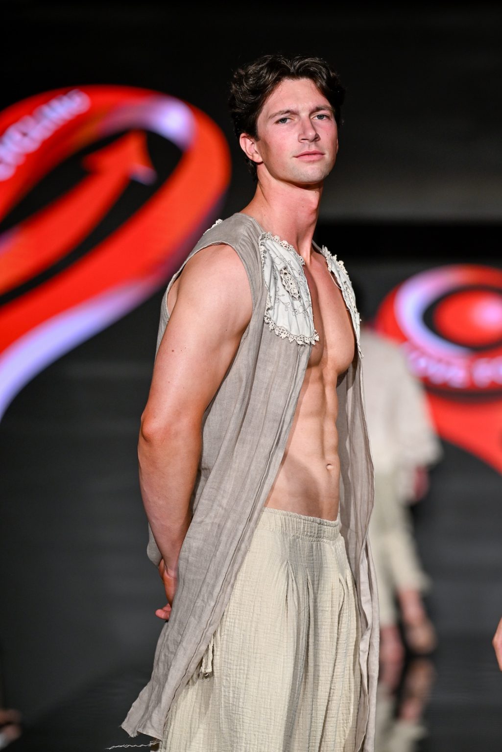 MIAMI BEACH, FLORIDA - MAY 31: A model walks the runway at the Love For Upcycling show during Miami Swim Week Powered By Art Hearts Fashion at Eden Roc Hotel on May 31, 2025 in Miami Beach, Florida. (Photo by Arun Nevader/Getty Images for Art Hearts Fashion)