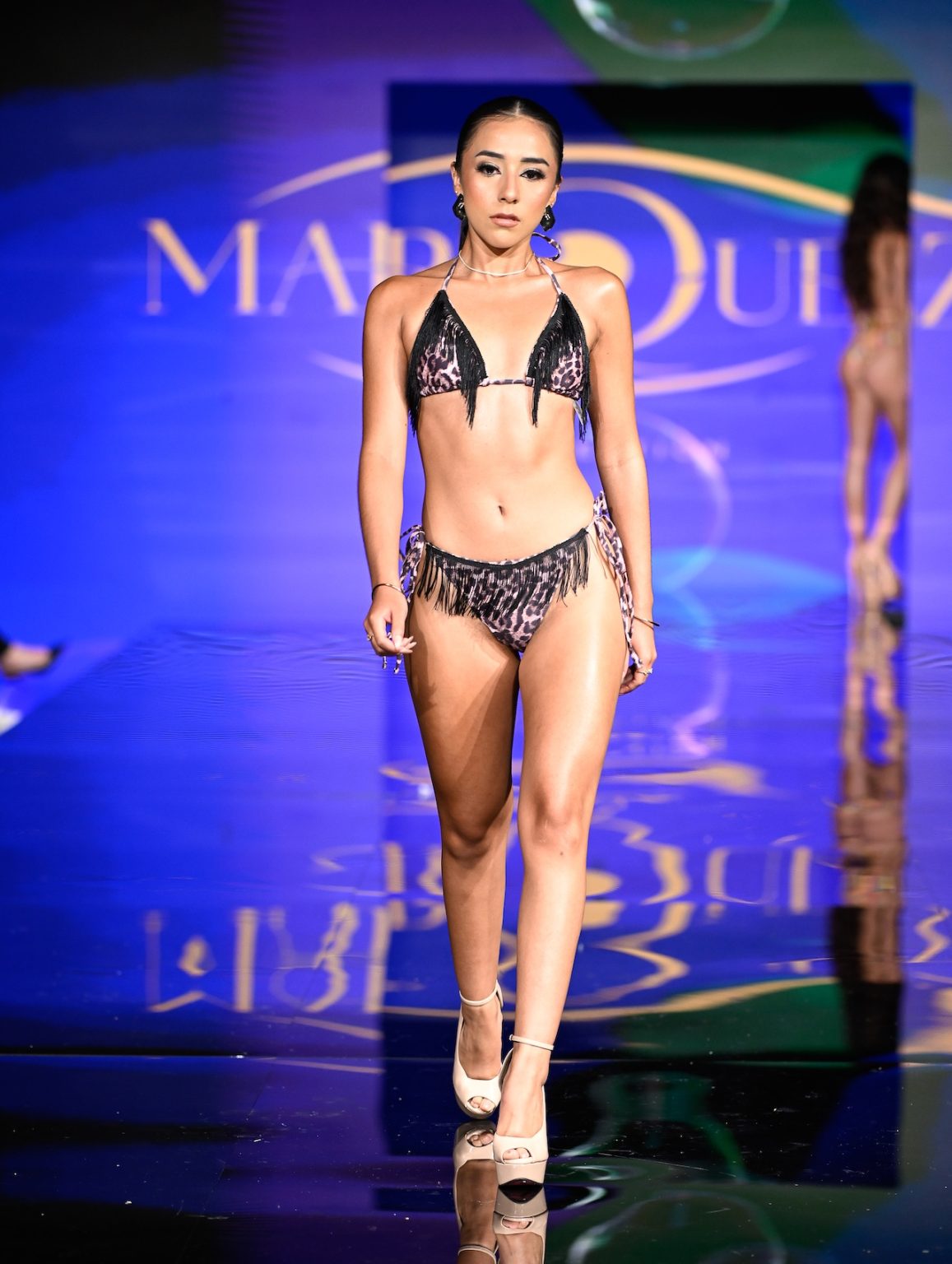 MIAMI BEACH, FLORIDA - MAY 31: A model walks the runway at the Marqueza show during Miami Swim Week Powered By Art Hearts Fashion at Eden Roc Hotel on May 31, 2025 in Miami Beach, Florida. (Photo by Arun Nevader/Getty Images for Art Hearts Fashion)