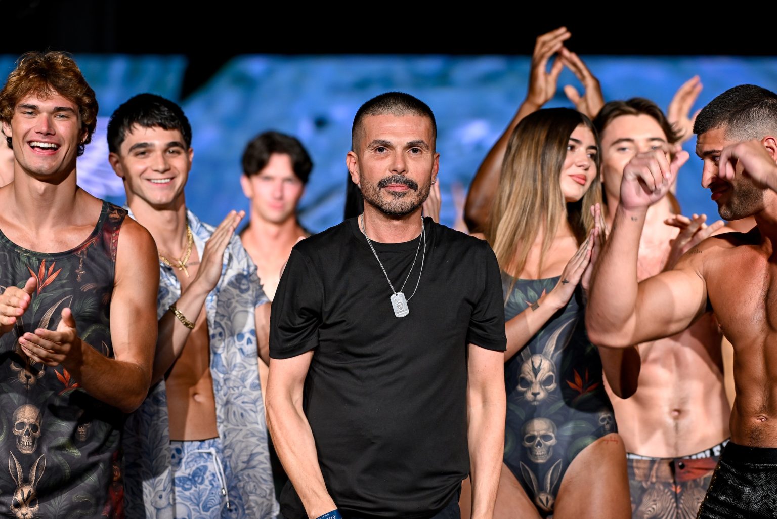 MIAMI BEACH, FLORIDA - MAY 31: Designer Erik Rosete and models walk the runway at the Mister Triple X show during Miami Swim Week Powered By Art Hearts Fashion at Eden Roc Hotel on May 31, 2025 in Miami Beach, Florida. (Photo by Arun Nevader/Getty Images for Art Hearts Fashion)