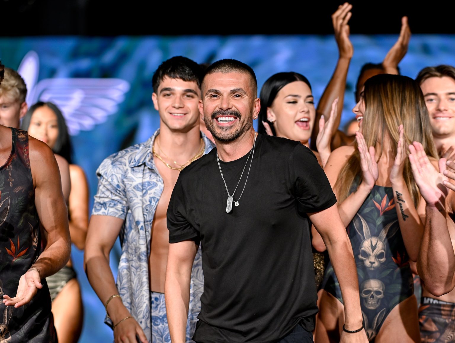 MIAMI BEACH, FLORIDA - MAY 31: Designer Erik Rosete and models walk the runway at the Mister Triple X show during Miami Swim Week Powered By Art Hearts Fashion at Eden Roc Hotel on May 31, 2025 in Miami Beach, Florida. (Photo by Arun Nevader/Getty Images for Art Hearts Fashion)