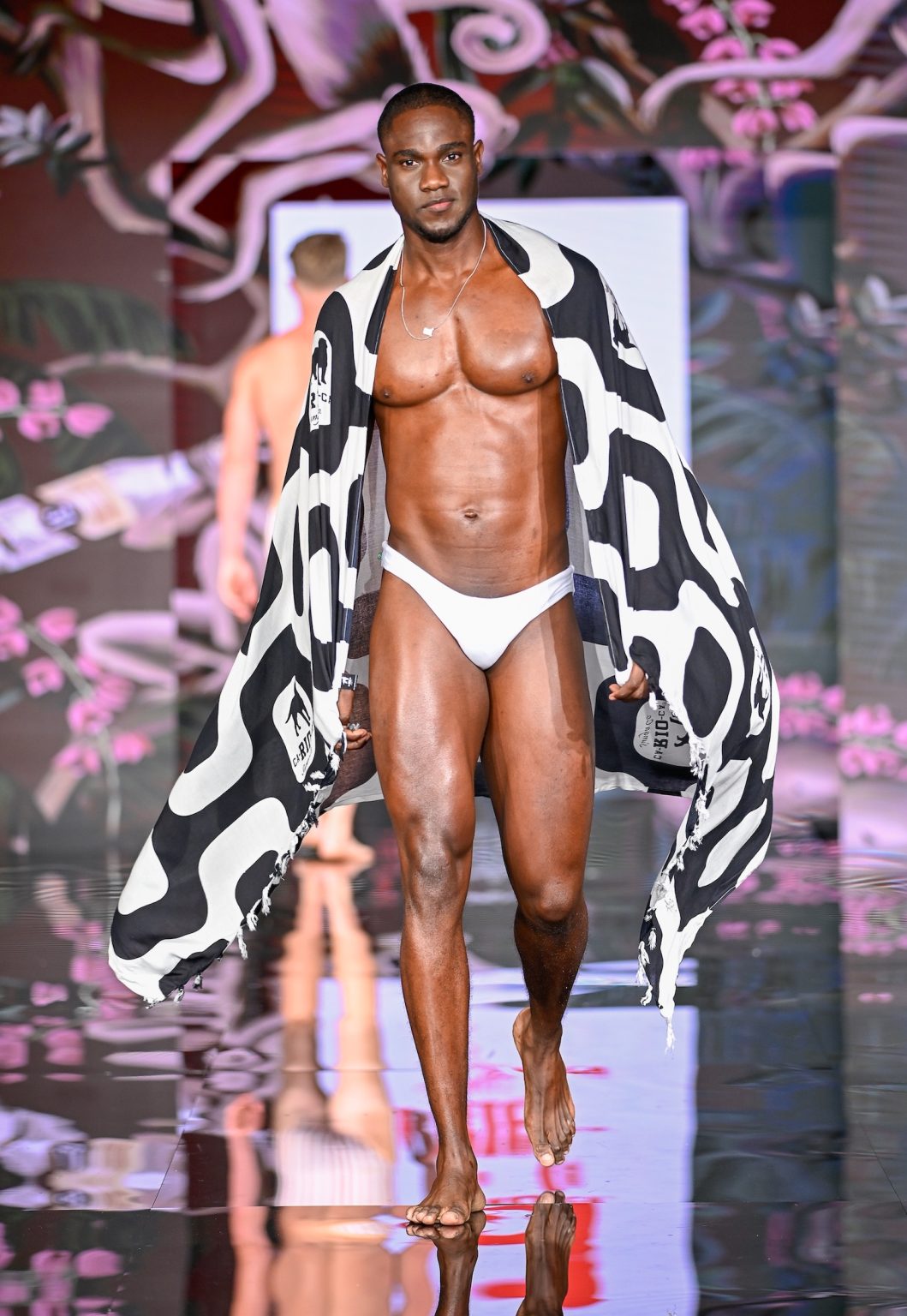 MIAMI BEACH, FLORIDA - MAY 30: A model walks the runway at the CA-RIO-CA Sunga Co. Show during Miami Swim Week Powered By Art Hearts Fashion at Eden Roc Hotel on May 30, 2025 in Miami Beach, Florida. (Photo by Arun Nevader/Getty Images for Art Hearts Fashion)