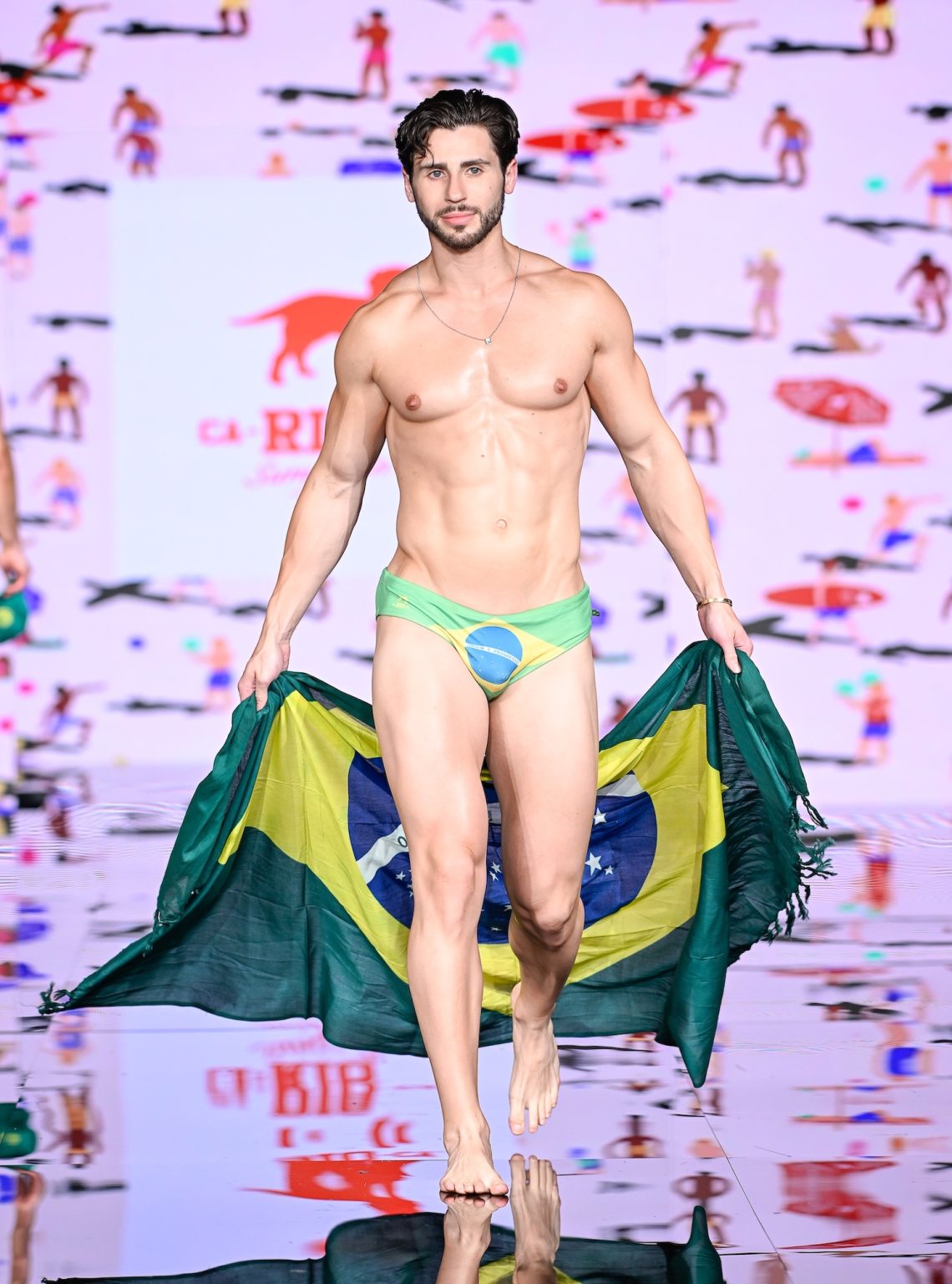 MIAMI BEACH, FLORIDA - MAY 30: A model walks the runway at the CA-RIO-CA Sunga Co. Show during Miami Swim Week Powered By Art Hearts Fashion at Eden Roc Hotel on May 30, 2025 in Miami Beach, Florida. (Photo by Arun Nevader/Getty Images for Art Hearts Fashion)
