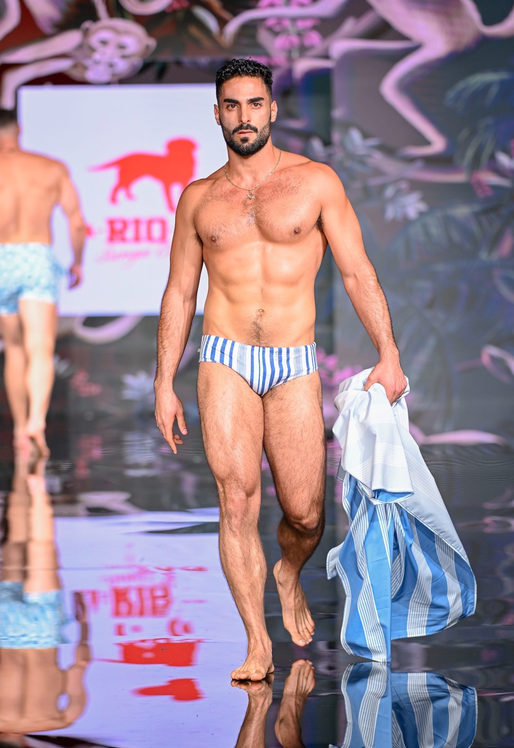 MIAMI BEACH, FLORIDA - MAY 30: A model walks the runway at the CA-RIO-CA Sunga Co. Show during Miami Swim Week Powered By Art Hearts Fashion at Eden Roc Hotel on May 30, 2025 in Miami Beach, Florida. (Photo by Arun Nevader/Getty Images for Art Hearts Fashion)
