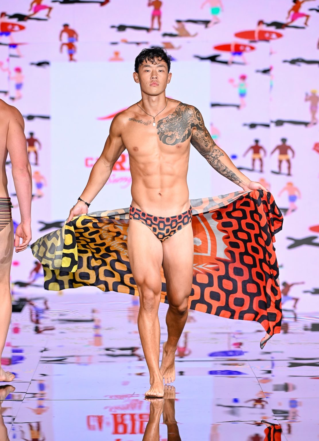MIAMI BEACH, FLORIDA - MAY 30: A model walks the runway at the CA-RIO-CA Sunga Co. Show during Miami Swim Week Powered By Art Hearts Fashion at Eden Roc Hotel on May 30, 2025 in Miami Beach, Florida. (Photo by Arun Nevader/Getty Images for Art Hearts Fashion)
