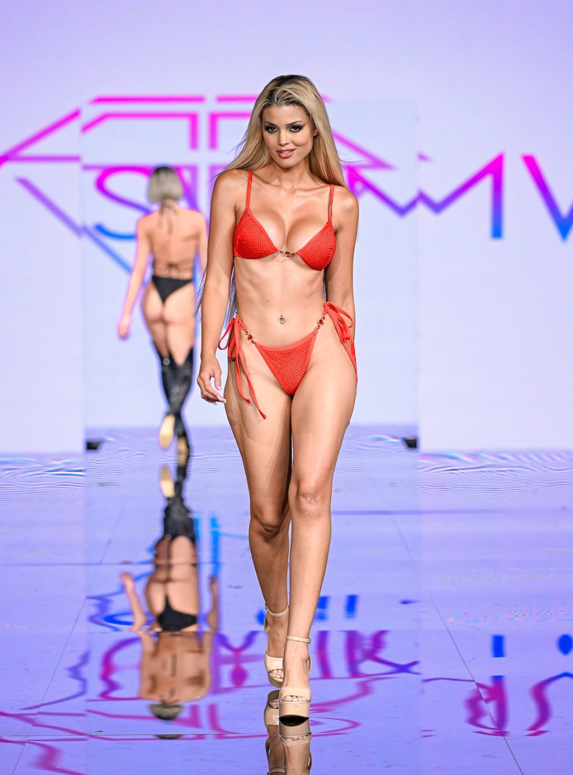 MIAMI BEACH, FLORIDA - MAY 30: Luana Larkin walks the runway at the Slay Swimwear Show during Miami Swim Week Powered By Art Hearts Fashion at Eden Roc Hotel on May 30, 2025 in Miami Beach, Florida. (Photo by Arun Nevader/Getty Images for Art Hearts Fashion)