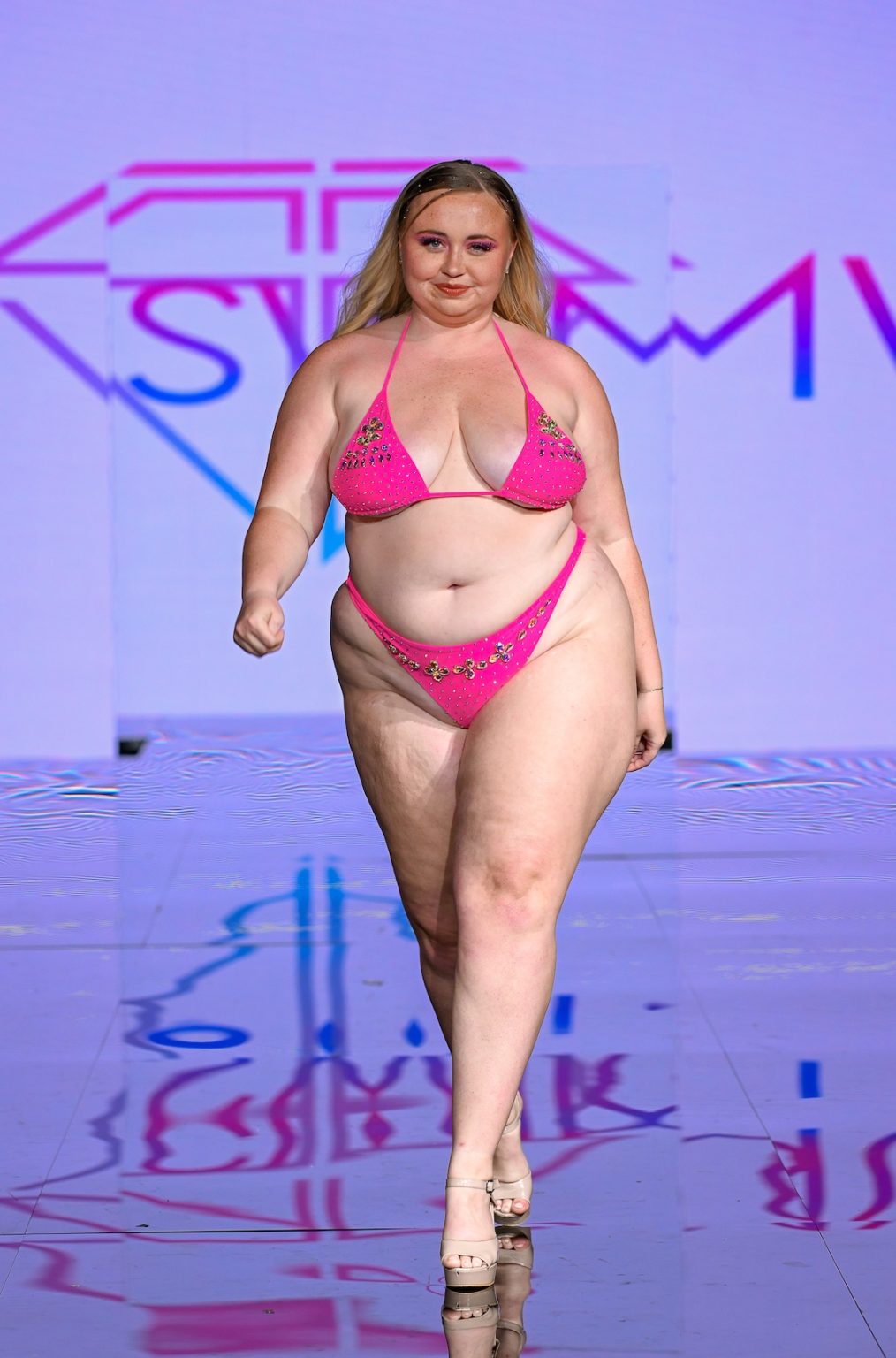 MIAMI BEACH, FLORIDA - MAY 30: A model walks the runway at the Slay Swimwear Show during Miami Swim Week Powered By Art Hearts Fashion at Eden Roc Hotel on May 30, 2025 in Miami Beach, Florida. (Photo by Arun Nevader/Getty Images for Art Hearts Fashion)