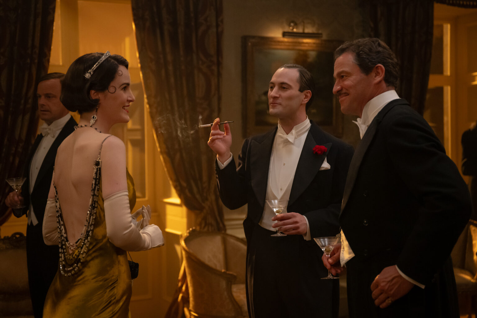 (L to R) Michelle Dockery stars as Lady Mary, Arty Froushan as Noël Coward and Dominic West as Guy Dexter in DOWNTON ABBEY: The Grand Finale, a Focus Features release. Credit: Rory Mulvey / © 2025 FOCUS FEATURES LLC