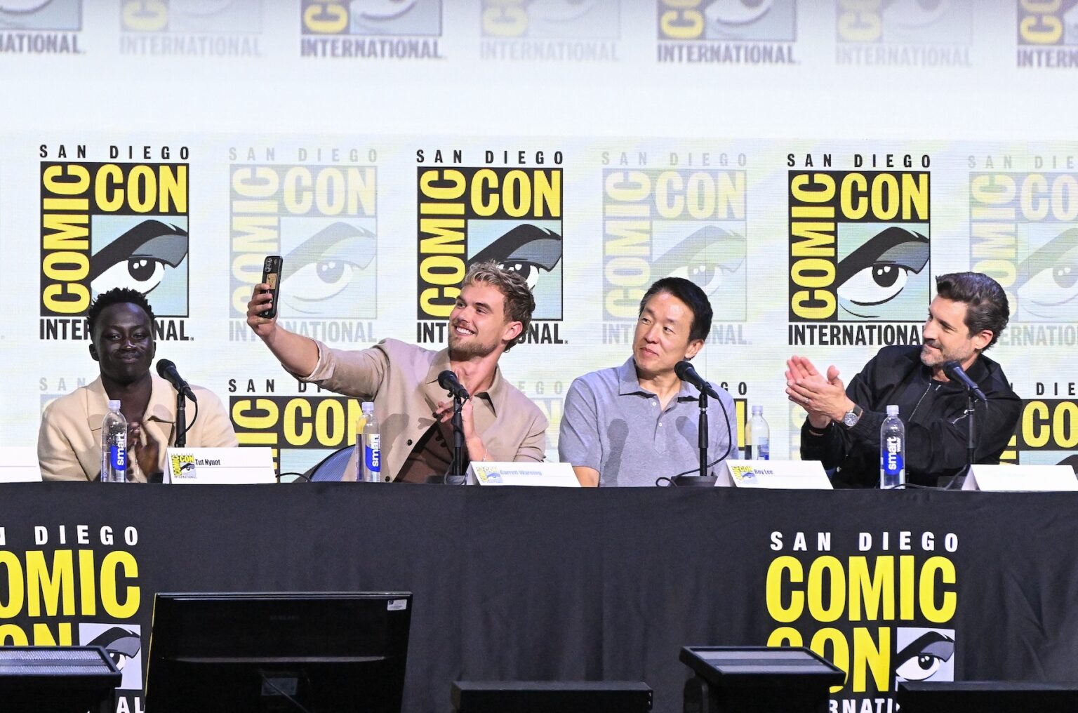 SAN DIEGO, CALIFORNIA - JULY 25: Tut Nyuot, Garrett Wareing, Roy Lee and J.T. Mollner speak during “The Long Walk” panel at San Diego Comic-Con International 2025 at San Diego Convention Center on July 25, 2025 in San Diego, California. (Photo by Vivien Killilea/Getty Images for Lionsgate)