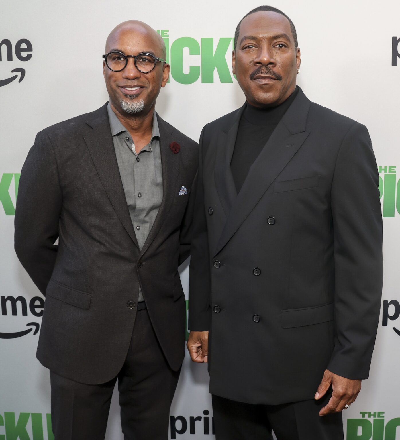 Tim Story and Eddie Murphy arrive at Amazon MGM Studios’ The Pickup Los Angeles Premiere on July 27, 2025 at Regal LA Live in Los Angeles.