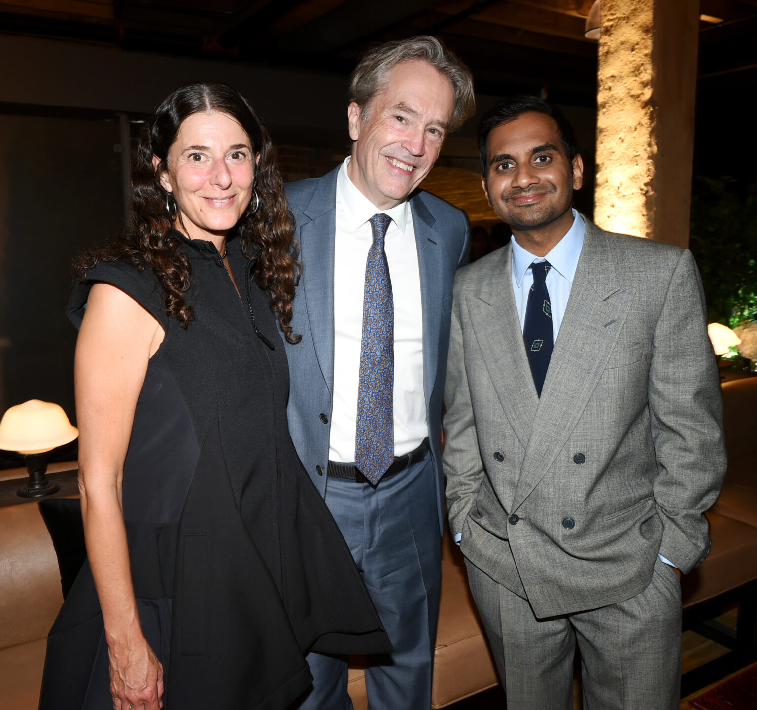 TORONTO, ONTARIO - SEPTEMBER 06: (L-R) Christine Sciulli, Carter Burwell, and Aziz Ansari attend the “Good Fortune” World Premiere at the Toronto International Film Festival on September 06, 2025 in Toronto, Ontario. (Photo by Vivien Killilea/Getty Images for Lionsgate)