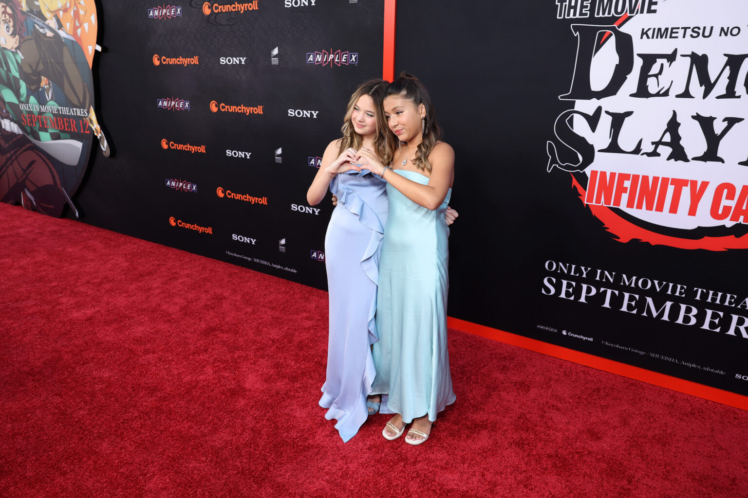 HOLLYWOOD, CALIFORNIA - SEPTEMBER 09: (L-R) Everly Tatum and guest attend the Los Angeles premiere of "Demon Slayer: Kimetsu No Yaiba Infinity Castle" at TCL Chinese Theatre on September 09, 2025 in Hollywood, California. (Photo by Randy Shropshire/Getty Images for Crunchyroll, Sony Pictures Entertainment, Aniplex)