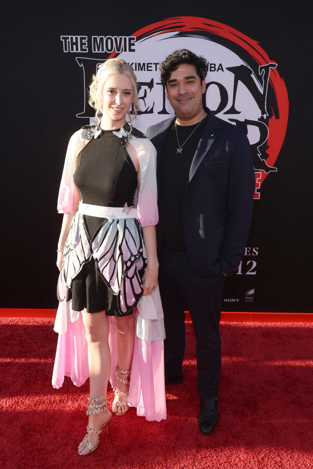 HOLLYWOOD, CALIFORNIA - SEPTEMBER 09: (L-R) Erika Harlacher and guest attend the Los Angeles premiere of "Demon Slayer: Kimetsu No Yaiba Infinity Castle" at TCL Chinese Theatre on September 09, 2025 in Hollywood, California. (Photo by Randy Shropshire/Getty Images for Crunchyroll, Sony Pictures Entertainment, Aniplex)