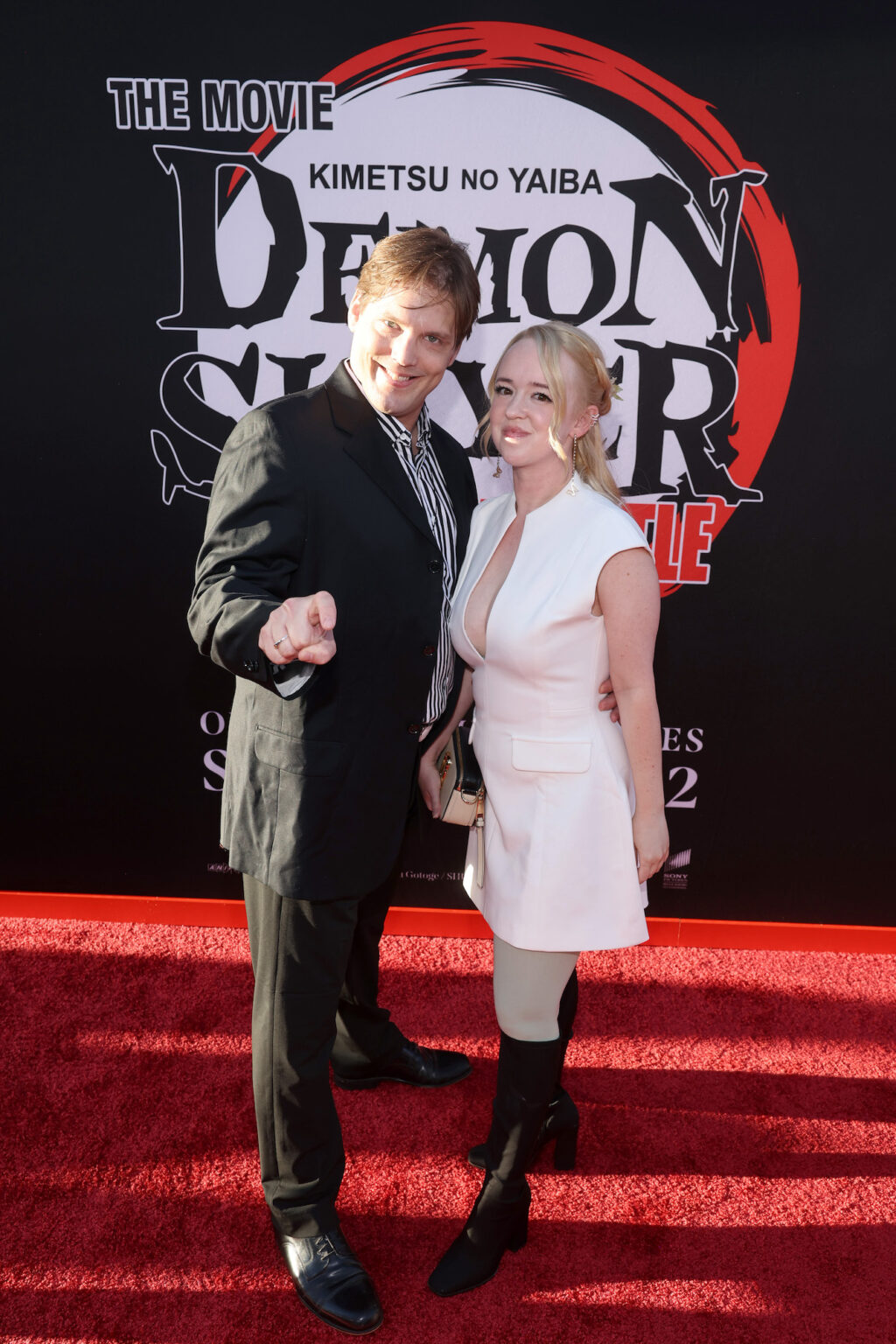 HOLLYWOOD, CALIFORNIA - SEPTEMBER 09: (L-R) Erik Scott Kimerer and guest attend the Los Angeles premiere of "Demon Slayer: Kimetsu No Yaiba Infinity Castle" at TCL Chinese Theatre on September 09, 2025 in Hollywood, California. (Photo by Randy Shropshire/Getty Images for Crunchyroll, Sony Pictures Entertainment, Aniplex)