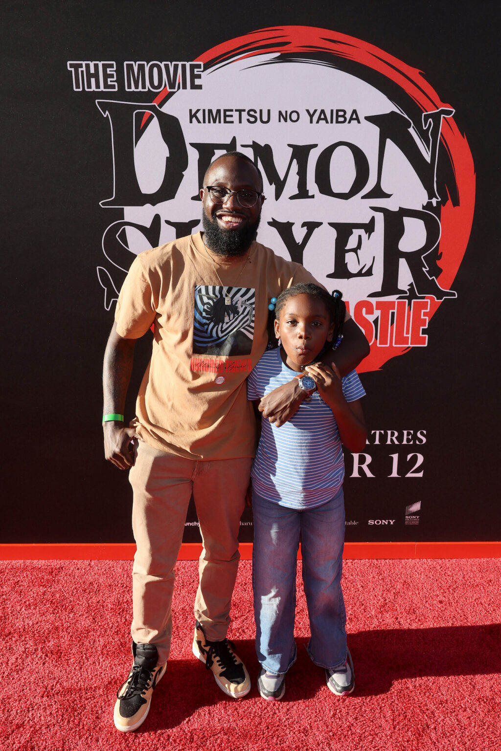 HOLLYWOOD, CALIFORNIA - SEPTEMBER 09: (L-R) Juju Green and guest attend the Los Angeles premiere of "Demon Slayer: Kimetsu No Yaiba Infinity Castle" at TCL Chinese Theatre on September 09, 2025 in Hollywood, California. (Photo by Randy Shropshire/Getty Images for Crunchyroll, Sony Pictures Entertainment, Aniplex)