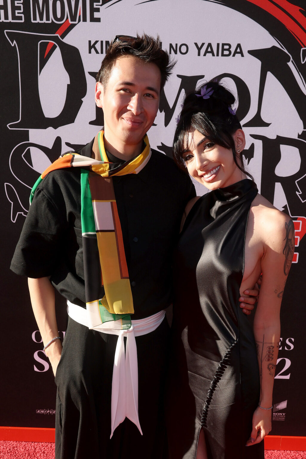 HOLLYWOOD, CALIFORNIA - SEPTEMBER 09: (L-R) King Chris and Gia Gerardi attend the Los Angeles premiere of "Demon Slayer: Kimetsu No Yaiba Infinity Castle" at TCL Chinese Theatre on September 09, 2025 in Hollywood, California. (Photo by Randy Shropshire/Getty Images for Crunchyroll, Sony Pictures Entertainment, Aniplex)