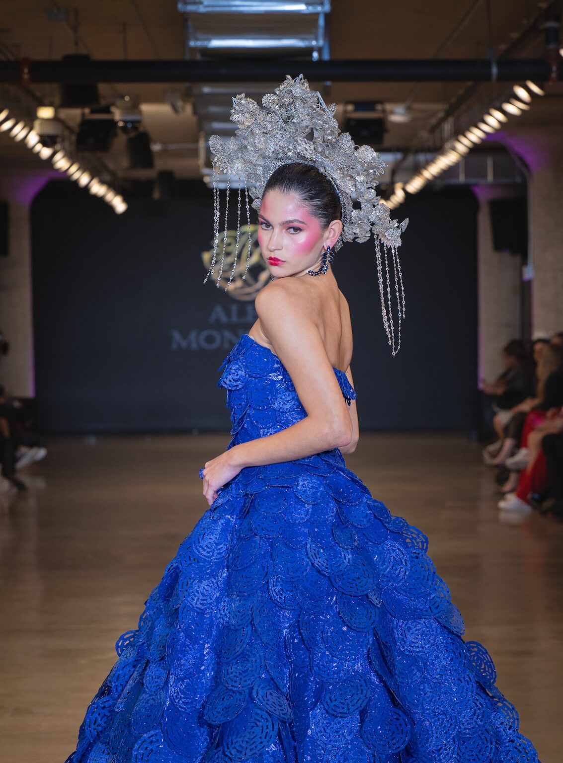 LOS ANGELES, CALIFORNIA - OCTOBER 16: A model walks the runway at the Alexis Monsanto show during Los Angeles Fashion Week Powered By Art Hearts Fashion at The New Mart on October 16, 2025 in Los Angeles, California. (Photo by Mark Gunter/Getty Images for Art Hearts Fashion)