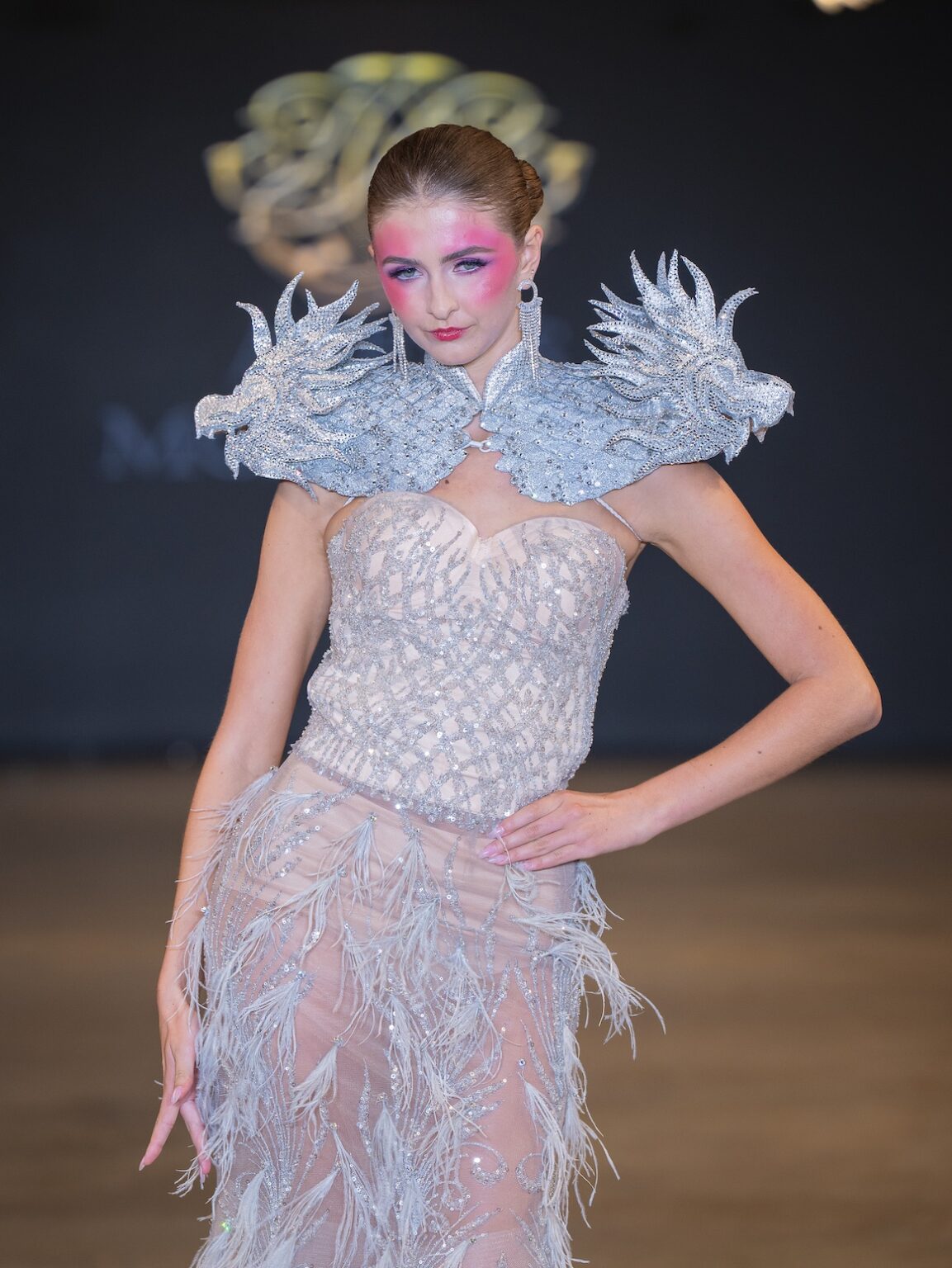 LOS ANGELES, CALIFORNIA - OCTOBER 16: A model walks the runway at the Alexis Monsanto show during Los Angeles Fashion Week Powered By Art Hearts Fashion at The New Mart on October 16, 2025 in Los Angeles, California. (Photo by Mark Gunter/Getty Images for Art Hearts Fashion)