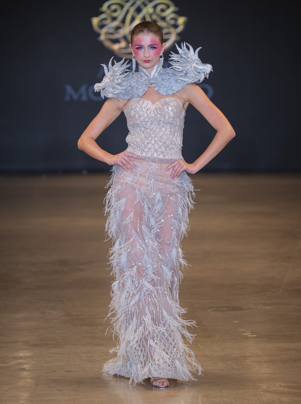 LOS ANGELES, CALIFORNIA - OCTOBER 16: A model walks the runway at the Alexis Monsanto show during Los Angeles Fashion Week Powered By Art Hearts Fashion at The New Mart on October 16, 2025 in Los Angeles, California. (Photo by Mark Gunter/Getty Images for Art Hearts Fashion)