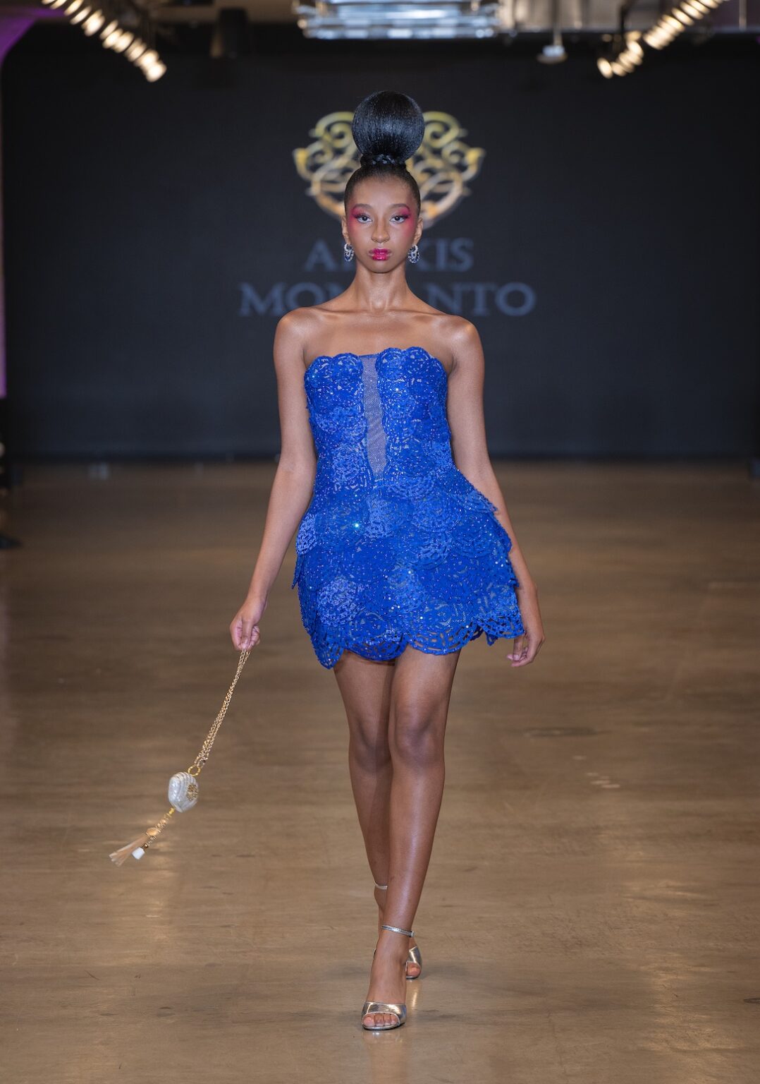 LOS ANGELES, CALIFORNIA - OCTOBER 16: A model walks the runway at the Alexis Monsanto show during Los Angeles Fashion Week Powered By Art Hearts Fashion at The New Mart on October 16, 2025 in Los Angeles, California. (Photo by Mark Gunter/Getty Images for Art Hearts Fashion)