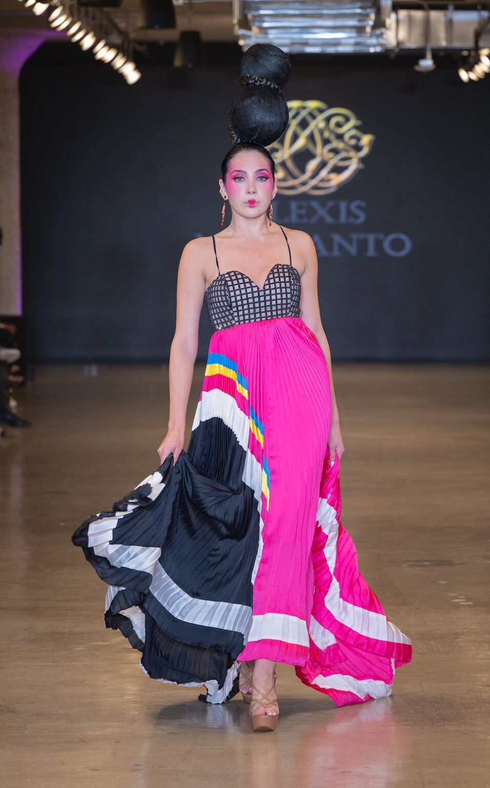 LOS ANGELES, CALIFORNIA - OCTOBER 16: A model walks the runway at the Alexis Monsanto show during Los Angeles Fashion Week Powered By Art Hearts Fashion at The New Mart on October 16, 2025 in Los Angeles, California. (Photo by Mark Gunter/Getty Images for Art Hearts Fashion)