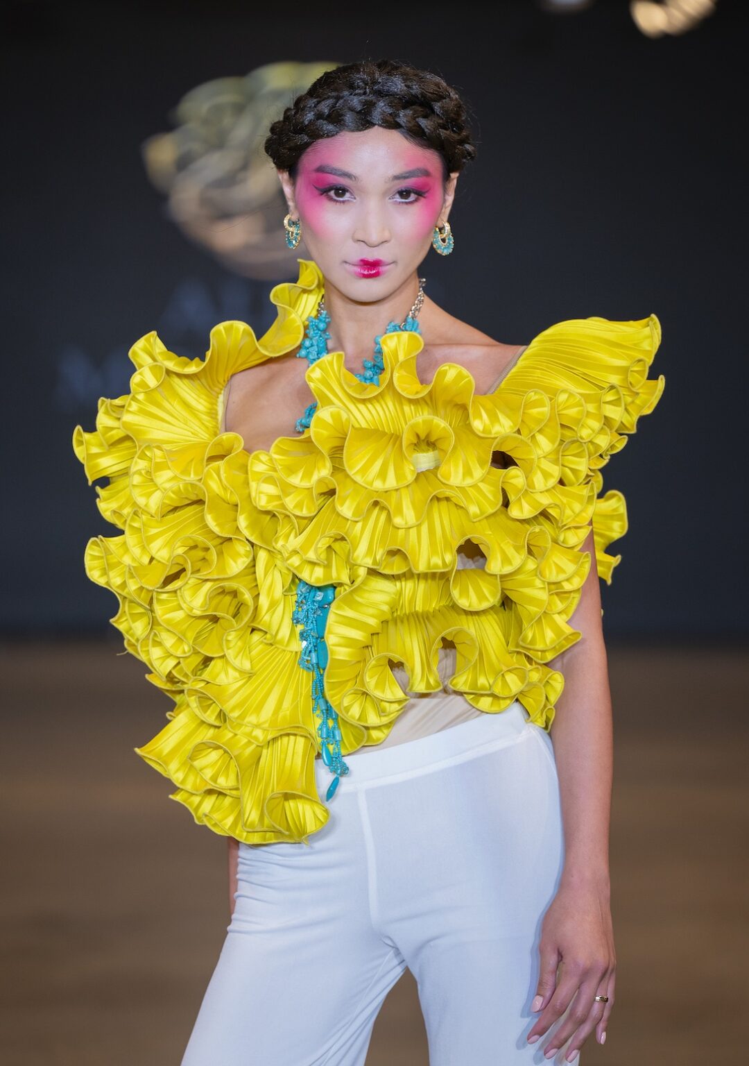 LOS ANGELES, CALIFORNIA - OCTOBER 16: A model walks the runway at the Alexis Monsanto show during Los Angeles Fashion Week Powered By Art Hearts Fashion at The New Mart on October 16, 2025 in Los Angeles, California. (Photo by Mark Gunter/Getty Images for Art Hearts Fashion)