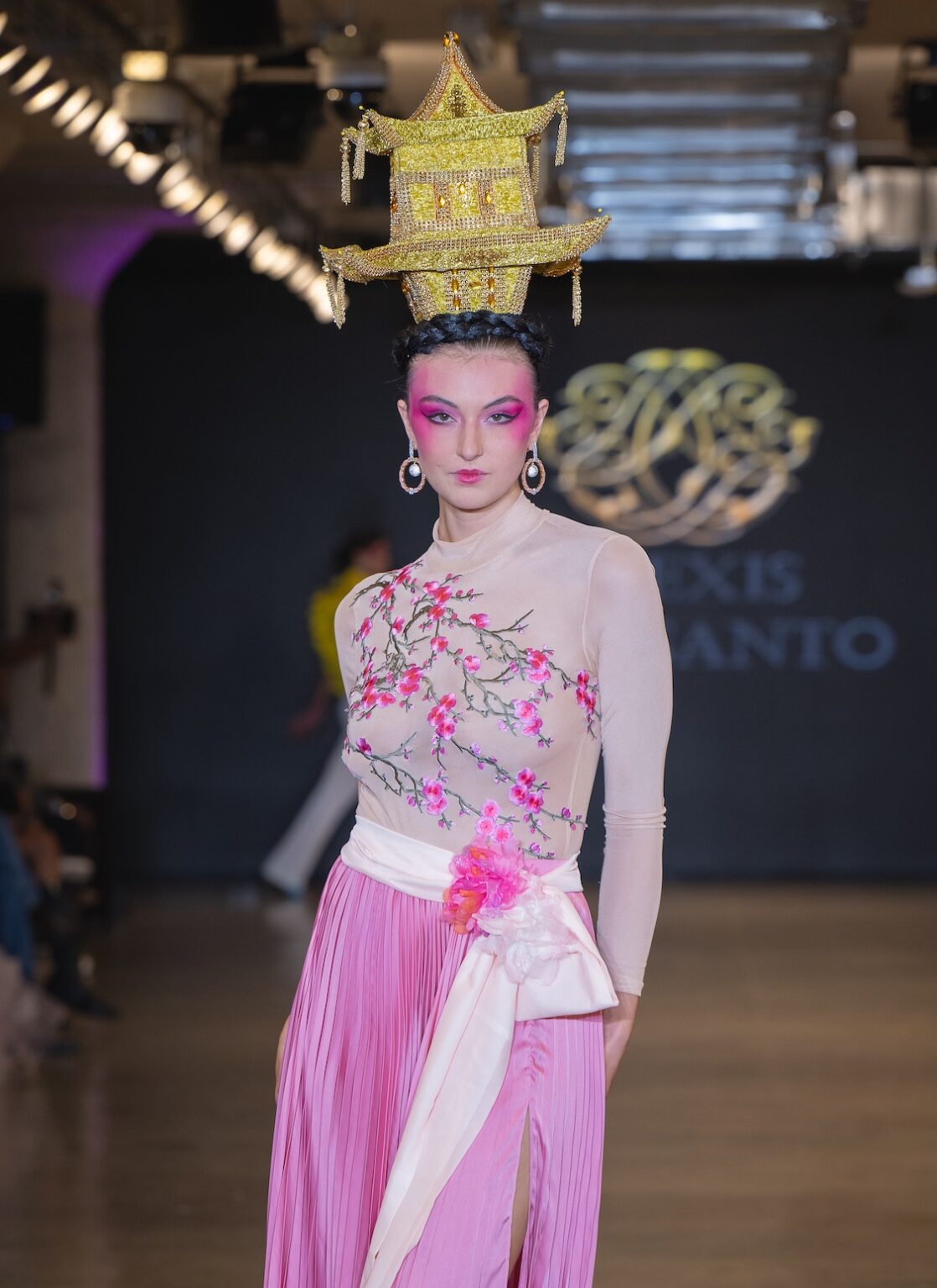 LOS ANGELES, CALIFORNIA - OCTOBER 16: A model walks the runway at the Alexis Monsanto show during Los Angeles Fashion Week Powered By Art Hearts Fashion at The New Mart on October 16, 2025 in Los Angeles, California. (Photo by Mark Gunter/Getty Images for Art Hearts Fashion)