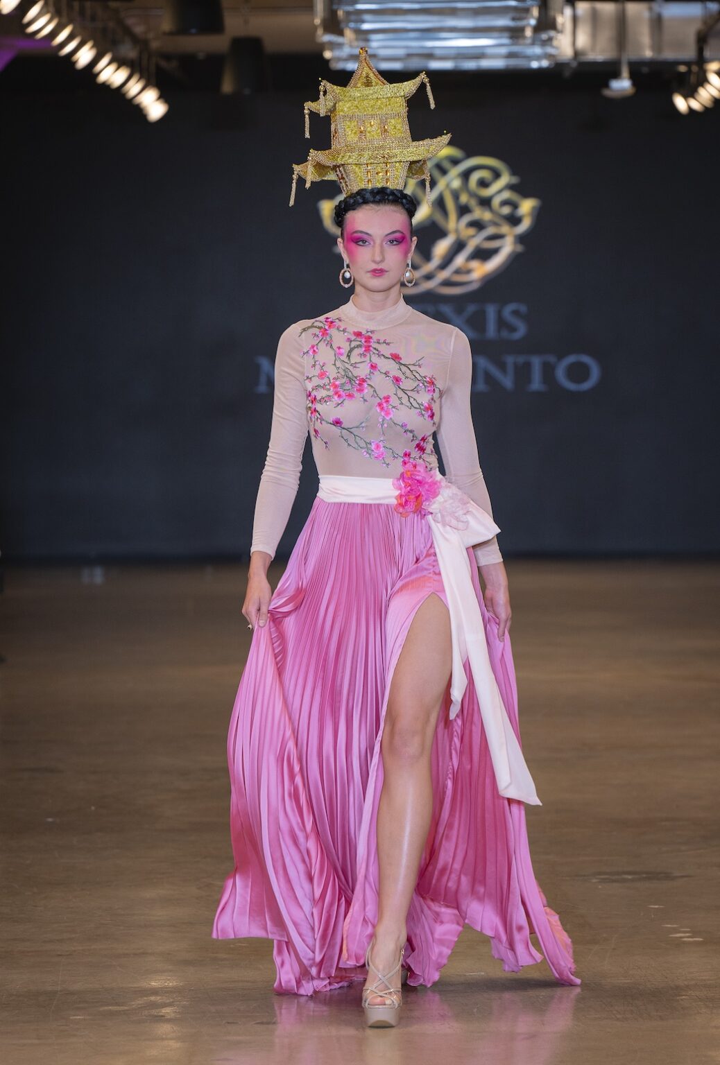 LOS ANGELES, CALIFORNIA - OCTOBER 16: A model walks the runway at the Alexis Monsanto show during Los Angeles Fashion Week Powered By Art Hearts Fashion at The New Mart on October 16, 2025 in Los Angeles, California. (Photo by Mark Gunter/Getty Images for Art Hearts Fashion)