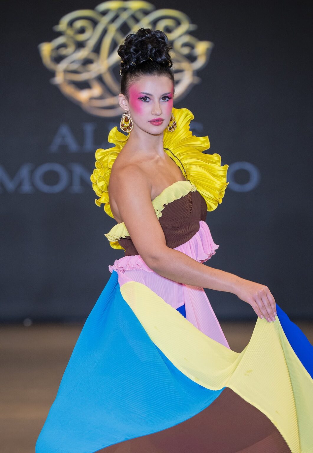 LOS ANGELES, CALIFORNIA - OCTOBER 16: A model walks the runway at the Alexis Monsanto show during Los Angeles Fashion Week Powered By Art Hearts Fashion at The New Mart on October 16, 2025 in Los Angeles, California. (Photo by Mark Gunter/Getty Images for Art Hearts Fashion)
