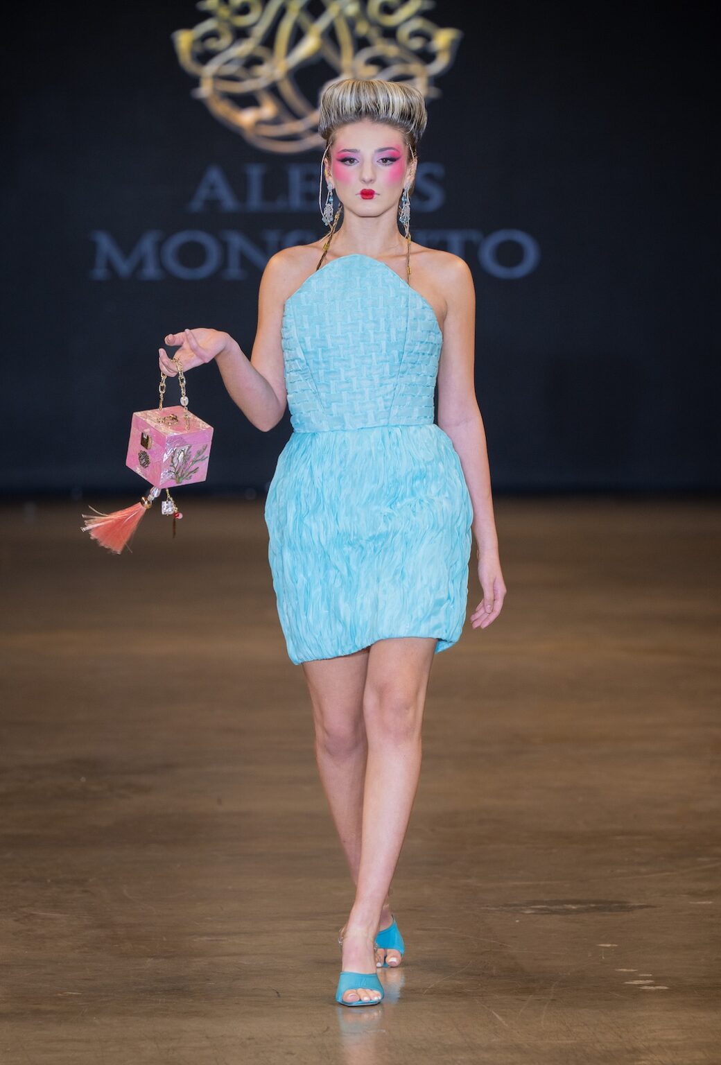LOS ANGELES, CALIFORNIA - OCTOBER 16: A model walks the runway at the Alexis Monsanto show during Los Angeles Fashion Week Powered By Art Hearts Fashion at The New Mart on October 16, 2025 in Los Angeles, California. (Photo by Mark Gunter/Getty Images for Art Hearts Fashion)