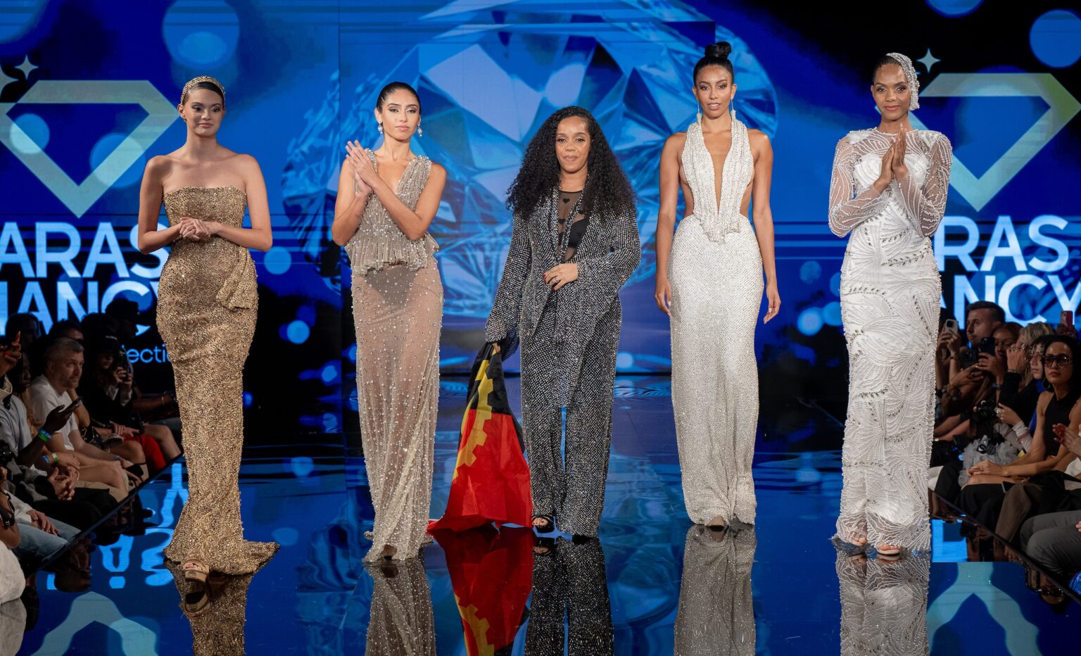 NEW YORK, NEW YORK - SEPTEMBER 12: Designer Aras Nancy and models walk the runway at the Aras Nancy show during New York Fashion Week Powered By Art Hearts Fashion at The Angel Orensanz Foundation on September 12, 2025 in New York City. (Photo by Mark Gunter/Getty Images for Art Hearts Fashion)