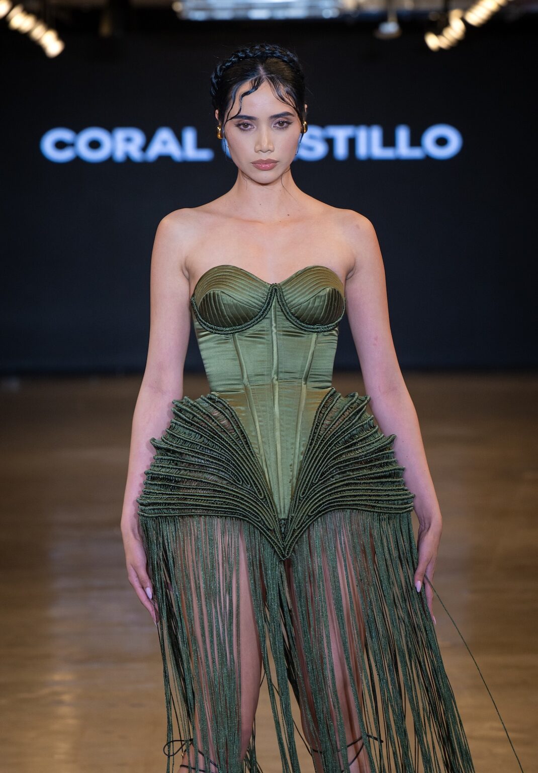 LOS ANGELES, CALIFORNIA - OCTOBER 16: A model walks the runway at the Coral Castillo show during Los Angeles Fashion Week Powered By Art Hearts Fashion at The New Mart on October 16, 2025 in Los Angeles, California. (Photo by Mark Gunter/Getty Images for Art Hearts Fashion)