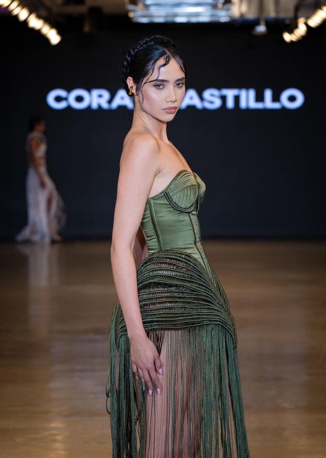 LOS ANGELES, CALIFORNIA - OCTOBER 16: A model walks the runway at the Coral Castillo show during Los Angeles Fashion Week Powered By Art Hearts Fashion at The New Mart on October 16, 2025 in Los Angeles, California. (Photo by Mark Gunter/Getty Images for Art Hearts Fashion)