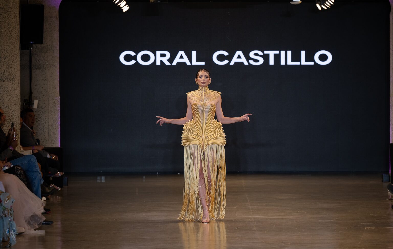 LOS ANGELES, CALIFORNIA - OCTOBER 16: A model walks the runway at the Coral Castillo show during Los Angeles Fashion Week Powered By Art Hearts Fashion at The New Mart on October 16, 2025 in Los Angeles, California. (Photo by Mark Gunter/Getty Images for Art Hearts Fashion)