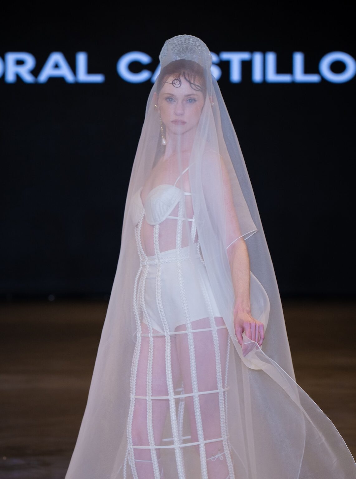 LOS ANGELES, CALIFORNIA - OCTOBER 16: A model walks the runway at the Coral Castillo show during Los Angeles Fashion Week Powered By Art Hearts Fashion at The New Mart on October 16, 2025 in Los Angeles, California. (Photo by Mark Gunter/Getty Images for Art Hearts Fashion)
