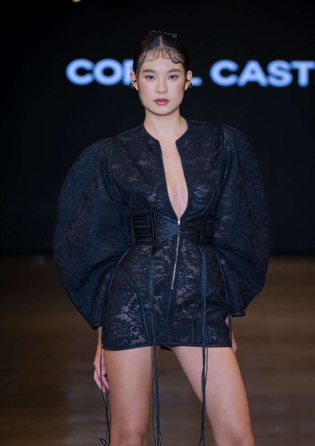 LOS ANGELES, CALIFORNIA - OCTOBER 16: A model walks the runway at the Coral Castillo show during Los Angeles Fashion Week Powered By Art Hearts Fashion at The New Mart on October 16, 2025 in Los Angeles, California. (Photo by Mark Gunter/Getty Images for Art Hearts Fashion)