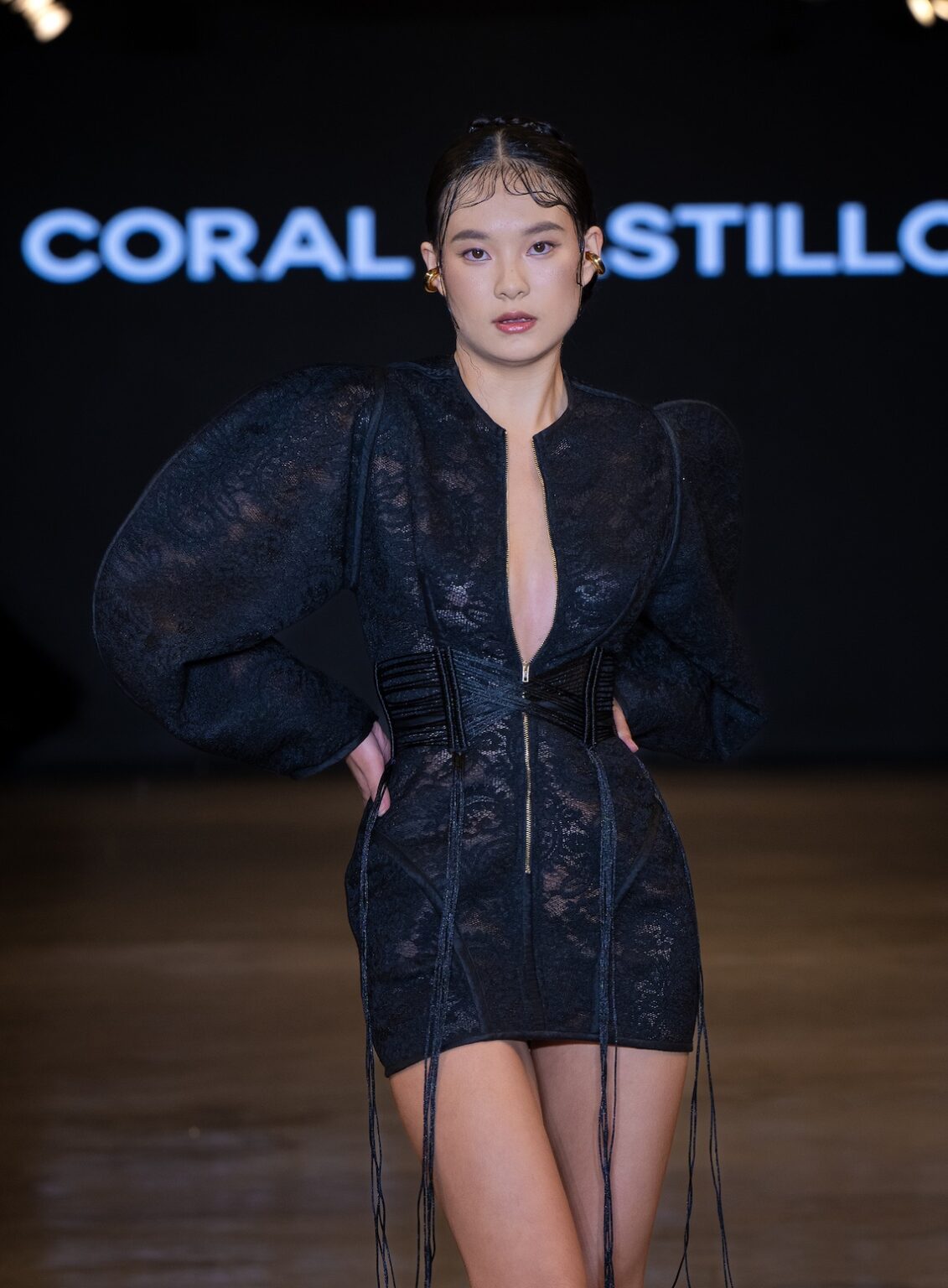 LOS ANGELES, CALIFORNIA - OCTOBER 16: A model walks the runway at the Coral Castillo show during Los Angeles Fashion Week Powered By Art Hearts Fashion at The New Mart on October 16, 2025 in Los Angeles, California. (Photo by Mark Gunter/Getty Images for Art Hearts Fashion)