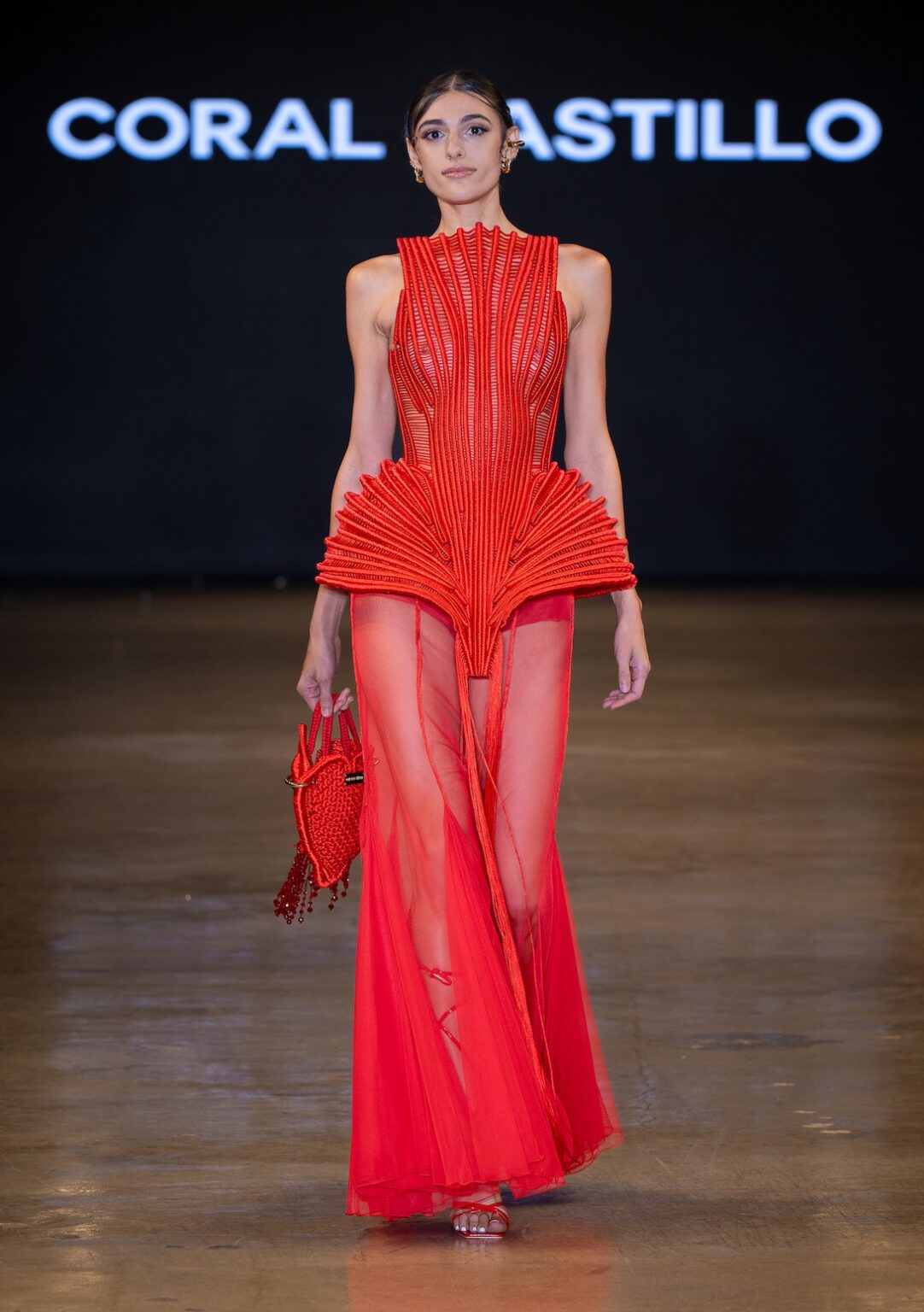 LOS ANGELES, CALIFORNIA - OCTOBER 16: A model walks the runway at the Coral Castillo show during Los Angeles Fashion Week Powered By Art Hearts Fashion at The New Mart on October 16, 2025 in Los Angeles, California. (Photo by Mark Gunter/Getty Images for Art Hearts Fashion)