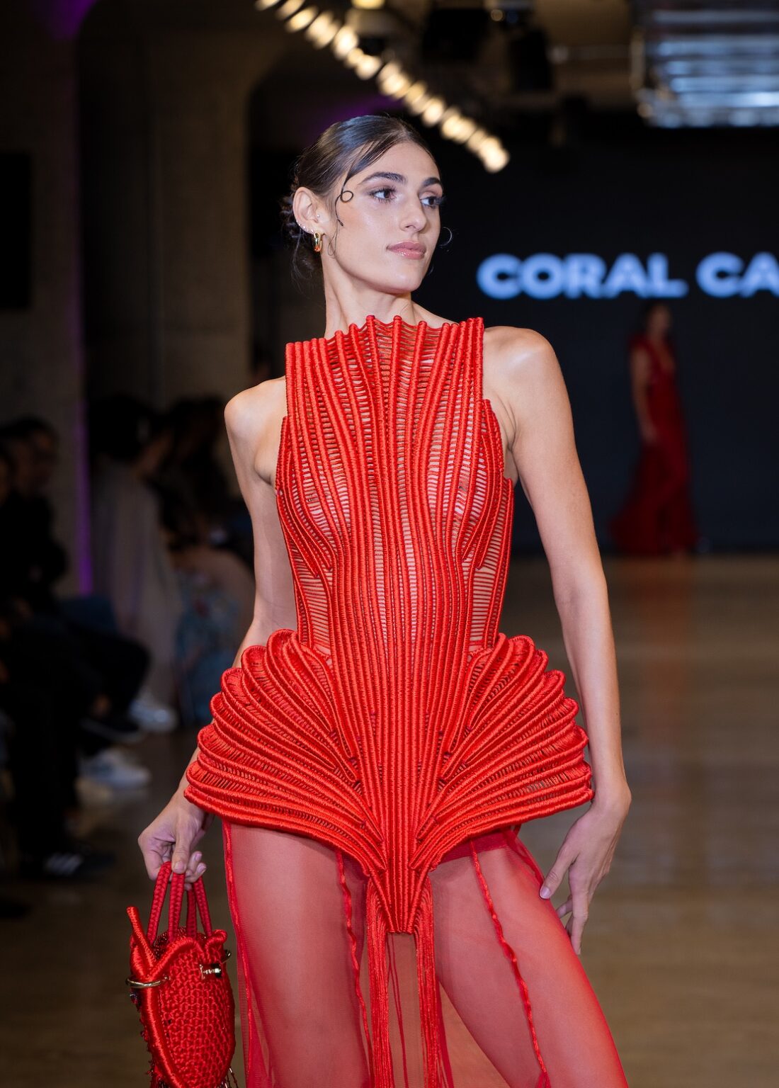 LOS ANGELES, CALIFORNIA - OCTOBER 16: A model walks the runway at the Coral Castillo show during Los Angeles Fashion Week Powered By Art Hearts Fashion at The New Mart on October 16, 2025 in Los Angeles, California. (Photo by Mark Gunter/Getty Images for Art Hearts Fashion)