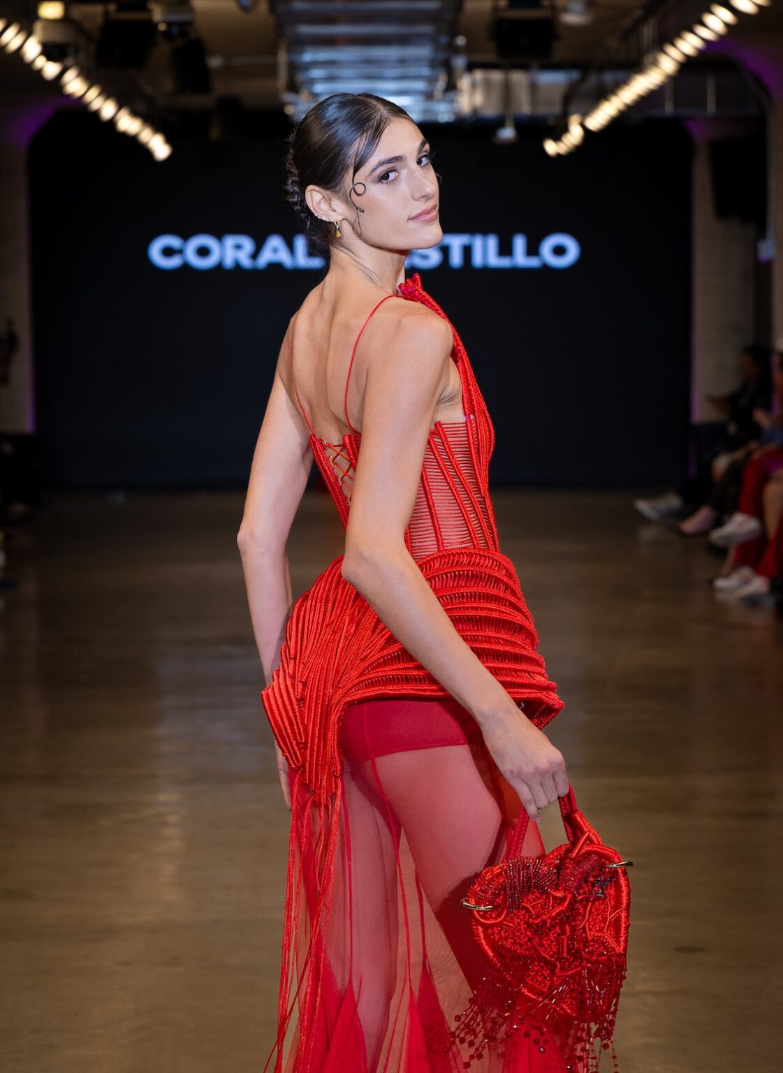 LOS ANGELES, CALIFORNIA - OCTOBER 16: A model walks the runway at the Coral Castillo show during Los Angeles Fashion Week Powered By Art Hearts Fashion at The New Mart on October 16, 2025 in Los Angeles, California. (Photo by Mark Gunter/Getty Images for Art Hearts Fashion)