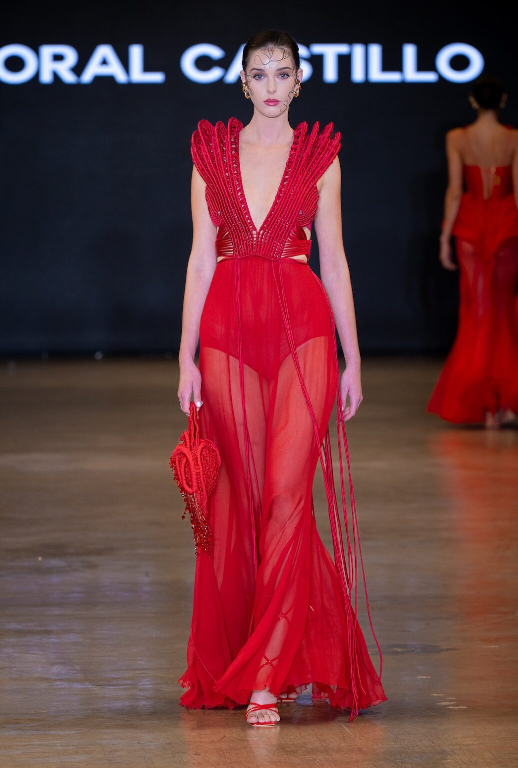 LOS ANGELES, CALIFORNIA - OCTOBER 16: A model walks the runway at the Coral Castillo show during Los Angeles Fashion Week Powered By Art Hearts Fashion at The New Mart on October 16, 2025 in Los Angeles, California. (Photo by Mark Gunter/Getty Images for Art Hearts Fashion)