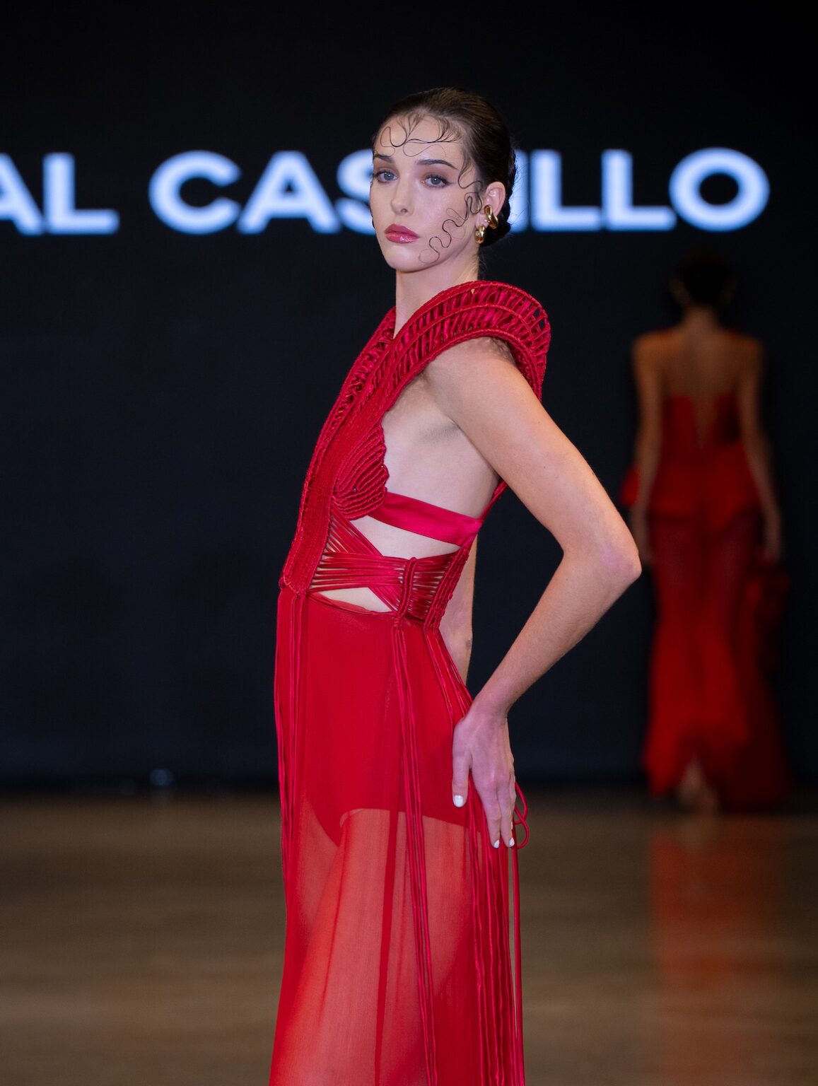 LOS ANGELES, CALIFORNIA - OCTOBER 16: A model walks the runway at the Coral Castillo show during Los Angeles Fashion Week Powered By Art Hearts Fashion at The New Mart on October 16, 2025 in Los Angeles, California. (Photo by Mark Gunter/Getty Images for Art Hearts Fashion)