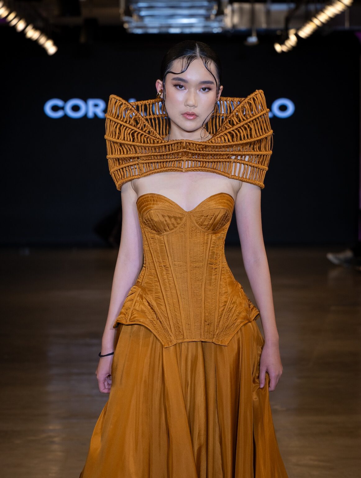 LOS ANGELES, CALIFORNIA - OCTOBER 16: A model walks the runway at the Coral Castillo show during Los Angeles Fashion Week Powered By Art Hearts Fashion at The New Mart on October 16, 2025 in Los Angeles, California. (Photo by Mark Gunter/Getty Images for Art Hearts Fashion)
